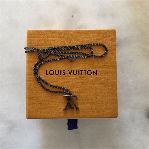 louis vuitton upside down necklace replica|false louis vuitton stitches.